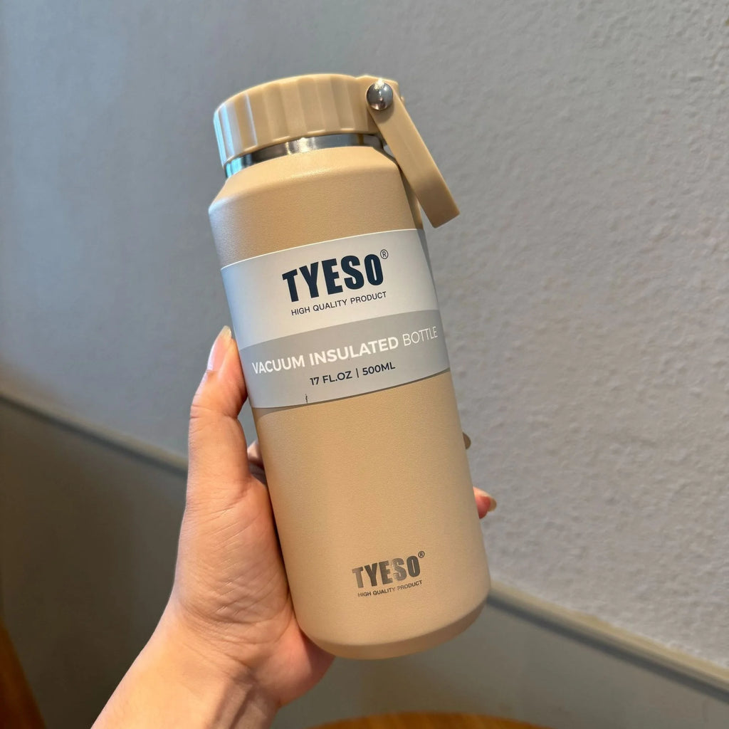 Gourde isotherme Tyeso grande capacité avec poignée, facile à ouvrir, idéale pour le sport, les voyages et l'hydratation. Convient aux hommes et aux femmes.