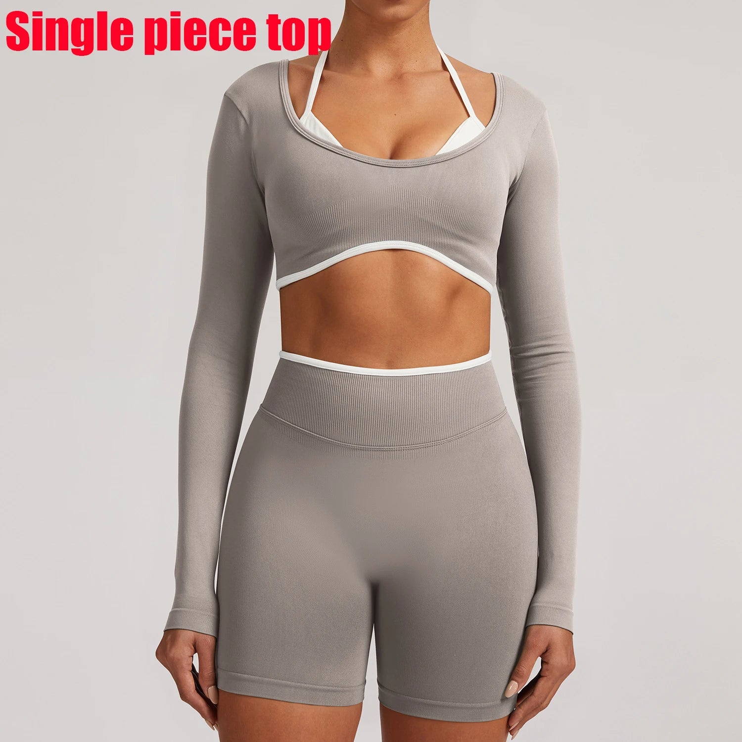 T-shirt de yoga femme sans coutures à manches longues, idéal pour le fitness, la course et la gym. Haut court respirant et extensible, parfait pour le sport.