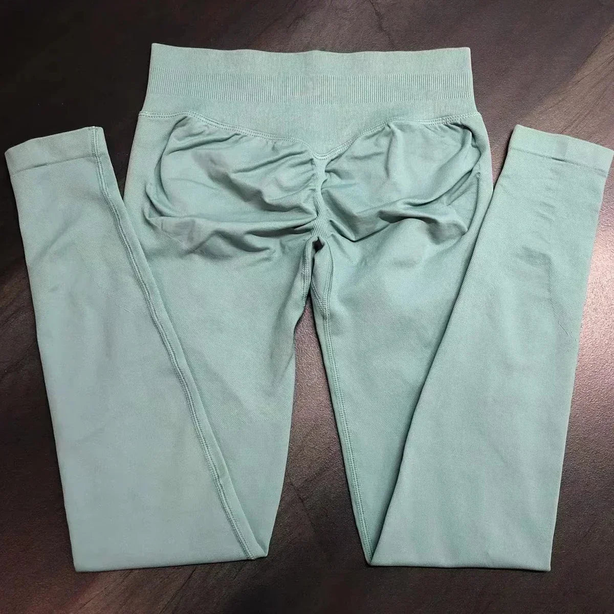 Legging de sport push-up sans logo, effet froncé, taille basse, sans coutures, idéal pour le yoga et le sport.