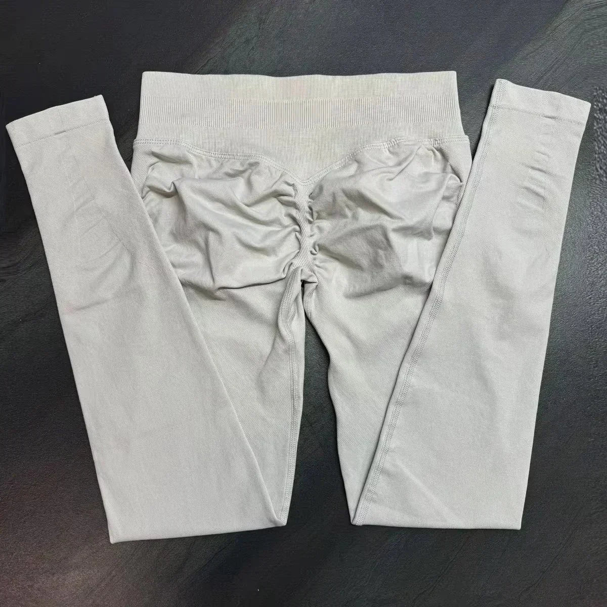 Legging de sport push-up sans logo, effet froncé, taille basse, sans coutures, idéal pour le yoga et le sport.